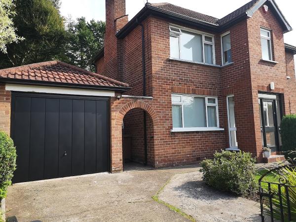 Tom Johnston Garage Door Specialist & Repairs