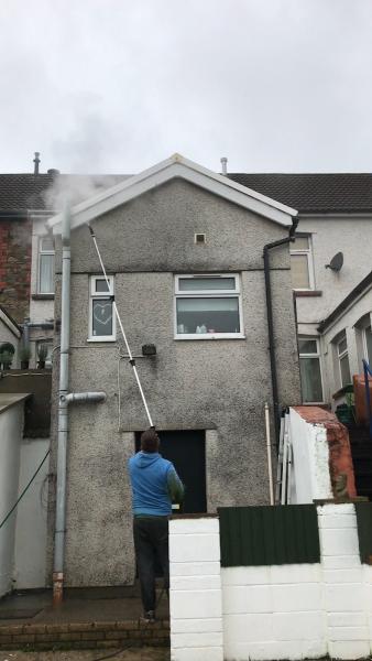 Close Building Roofing Maintenance