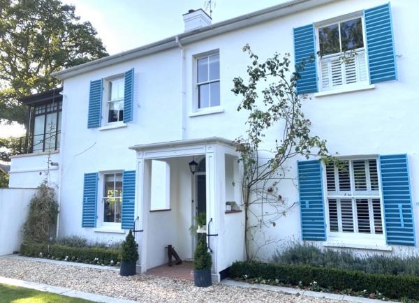 House With Blue Shutters