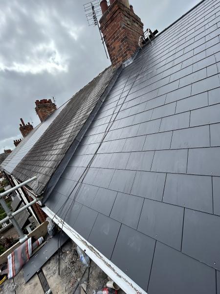 Dhm Roofing and Building Specialists LTD