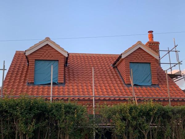 T Dent Roofing