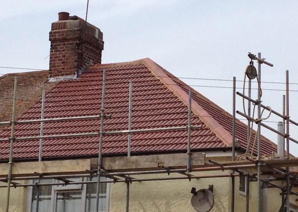 The New England Roofing Company