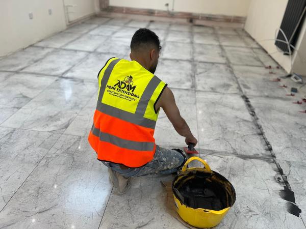 Adam Extensions & Building Construction